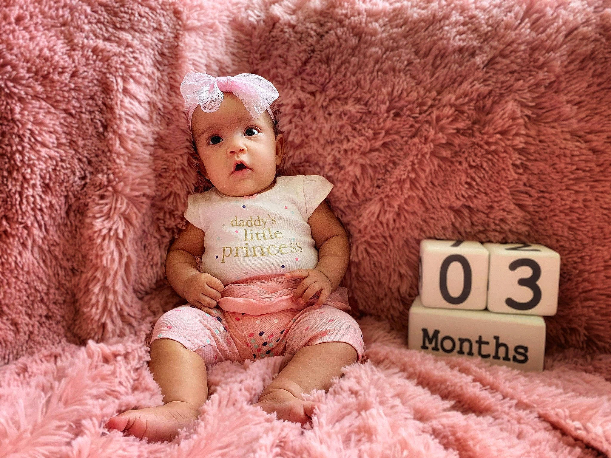 Nöel joined the competition — help win amazing prizes! baby, baby_toddler_clothing, brown_hair, child, doll, ear, fur, head, linens, outerwear, person, pink, product, sitting, skin, smile, stuffed_toy, teddy_bear, textile, toddler