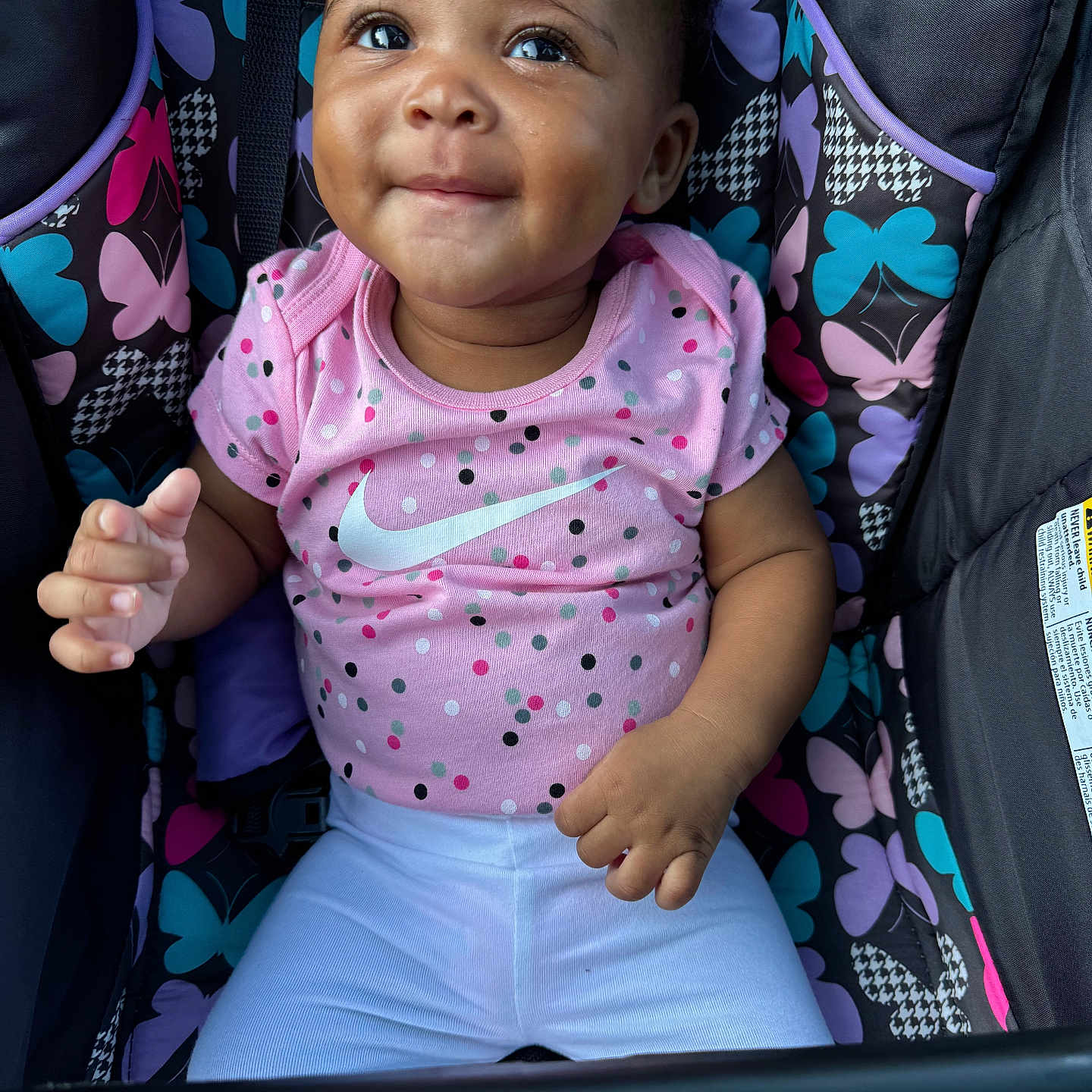 Zariyah is registered to the contest to win money with this photo: baby, babylaughing, bodypart, car, clothing, cushion, face, finger, furniture, hand, happy, head, homedecor, person, photography, portrait, smile, t_shirt, transportation, vehicle