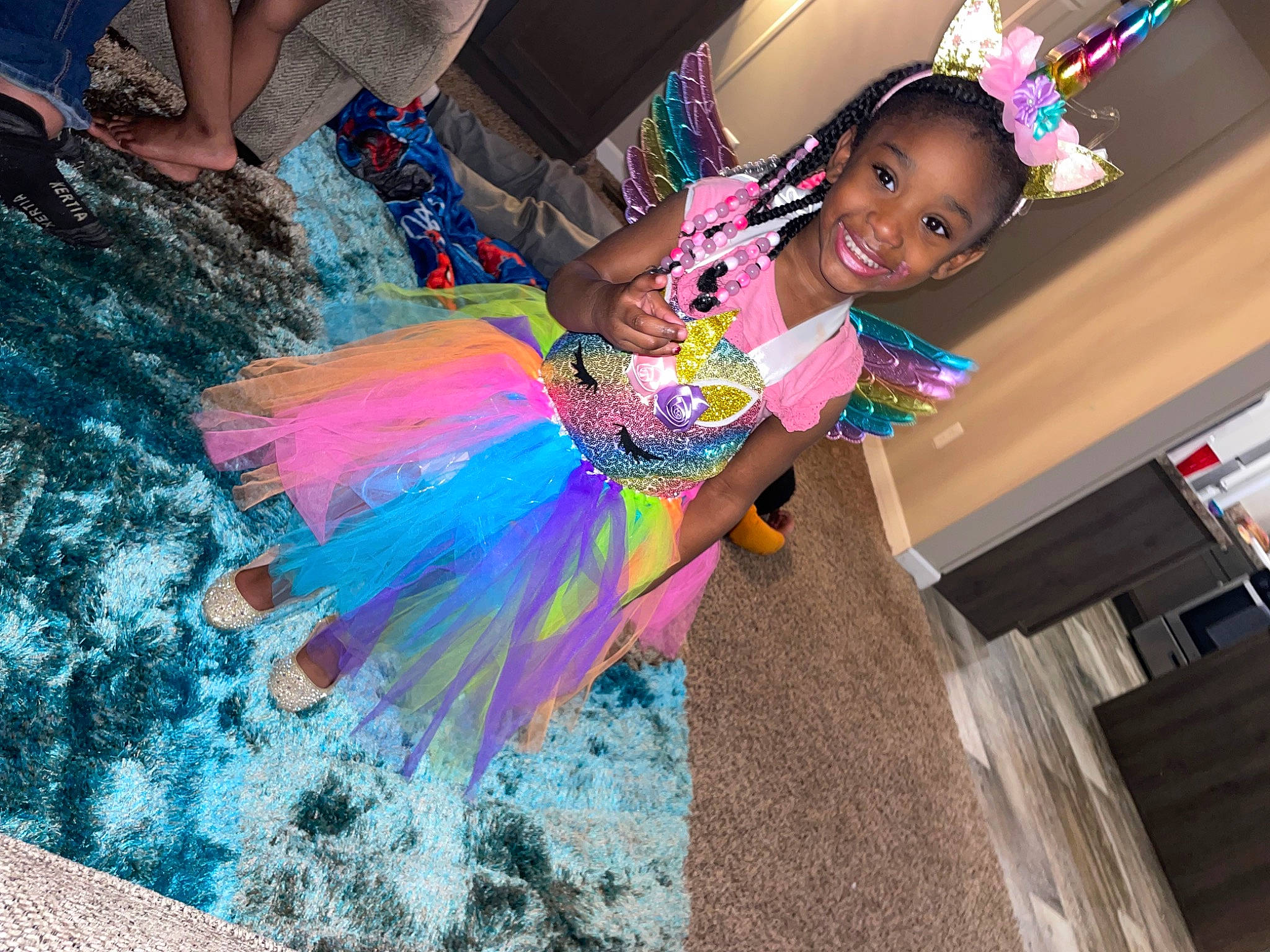 Amillia is registered to the contest to win money with this photo: child, costume, entertainment, event, fashion_accessory, fashion_design, feather, festival, fun, happy, headgear, joy, leisure, magenta, person, pink, public_event, purple, smile, snapshot