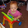 Amelia joined the competition — help win amazing prizes! activity, baby, carpet, carpeted_floor, child, colorful, cute, floor, footwear, furniture, home, indoor, infant, person, pink_clothing, playtime, plush_toys, toy, walker, young_child