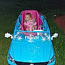 Amelia joined the competition — help win amazing prizes! baby, blue, car_seat, child, cute, frozen_theme, garden_light, grass, night, outdoor, person, pink, plastic, playtime, seatbelt, snowflake, steering_wheel, toy_car, vehicle, young_child