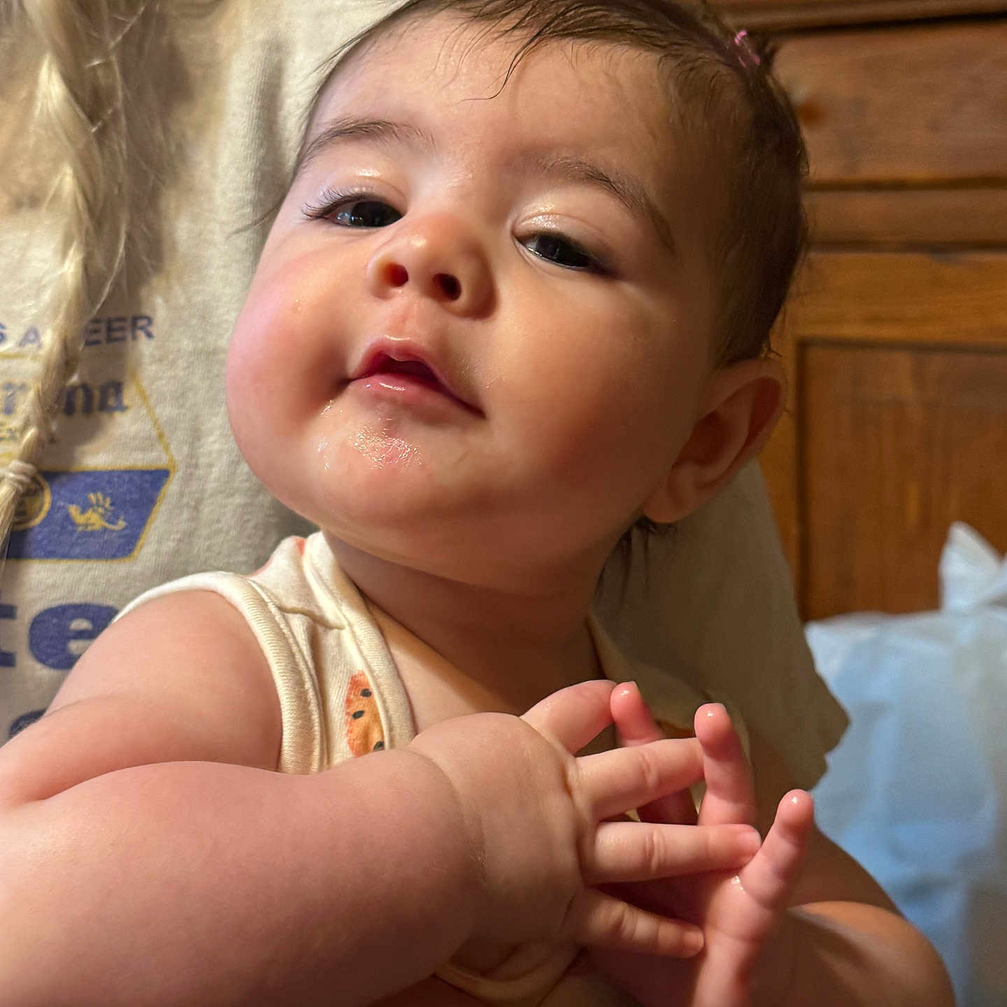 Amelia joined the competition — help win amazing prizes! ankle, arm, baby, bodypart, face, finger, hand, hardwood, head, mouth, newborn, person, photography, portrait, shelf, toe, wood, wrist