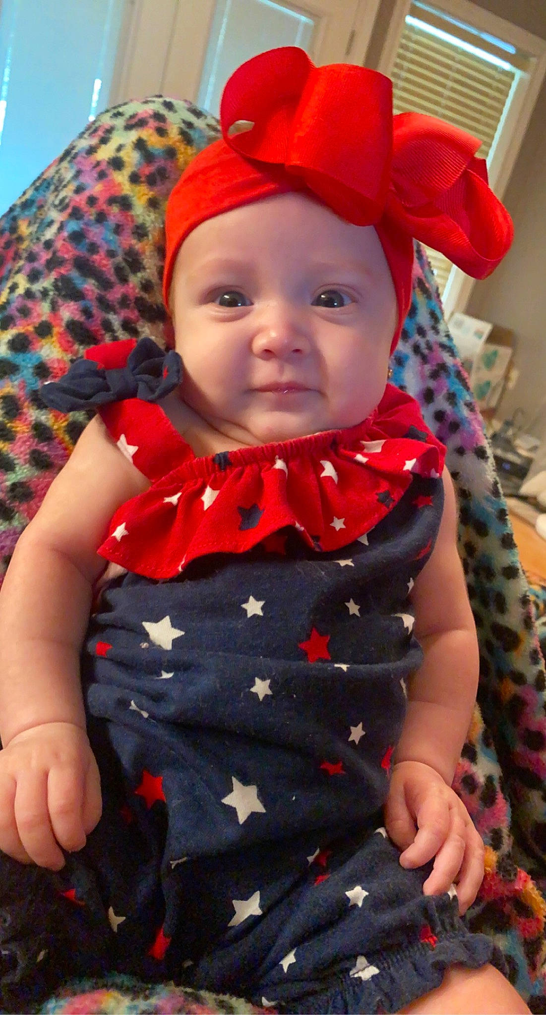 Kinsley is registered to the contest to win money with this photo: arm, baby, baby_toddler_clothing, costume_hat, dress, eye, happy, hat, head, headgear, headwear, iris, lip, neck, person, photograph, pink, red, skin, sleeve