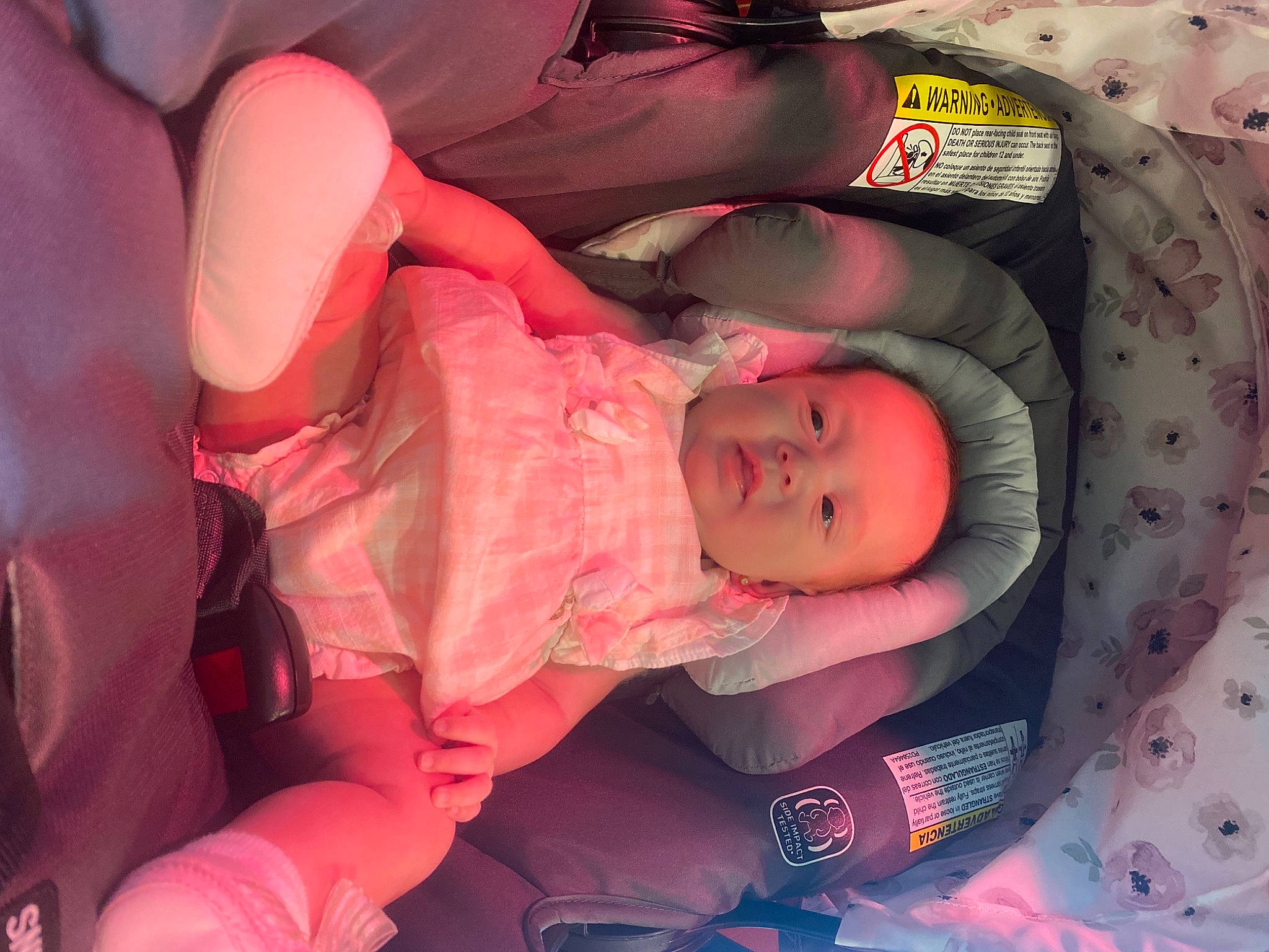 Kinsley is registered to the contest to win money with this photo: baby, baby_carriage, baby_products, baby_toddler_clothing, bedtime, car_seat, carmine, child, comfort, fun, human_body, lap, magenta, mouth, nap, person, pink, purple, room, sitting