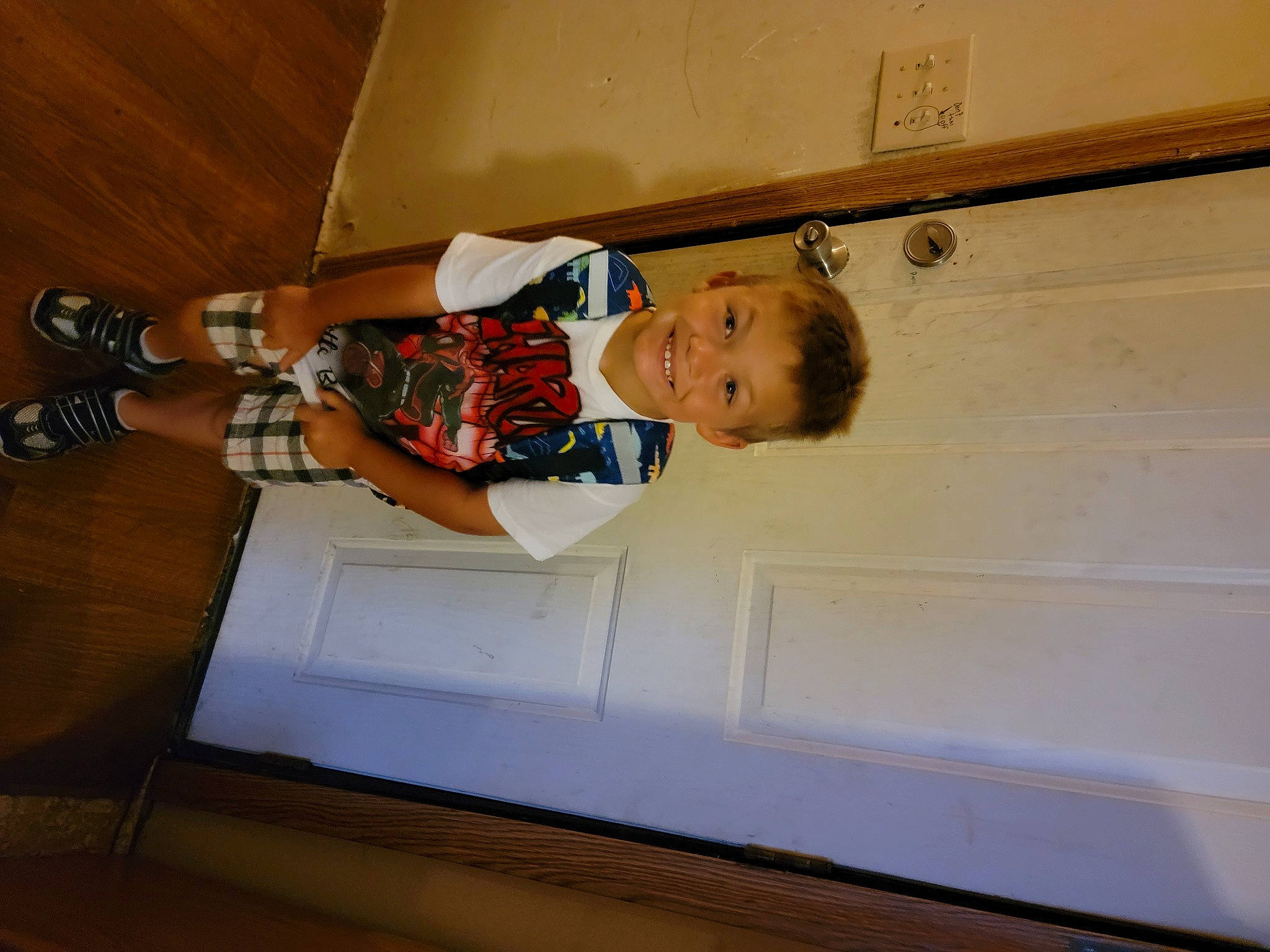 Charlie joined the competition — help win amazing prizes! baby, baby_toddler_clothing, child, comfort, dress, elbow, floor, flooring, fun, hardwood, human_leg, joy, knee, person, room, sleeve, t_shirt, thigh, toddler, wood