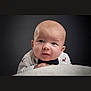 Greyson-James is registered to the contest to win money with this photo: baby, baby_boy, background, bow_tie, child, closeup, curious_expression, cute, face, head, indoors, infant, person, portrait, skin, small_person, soft_surface, studio_light, white_clothing, young