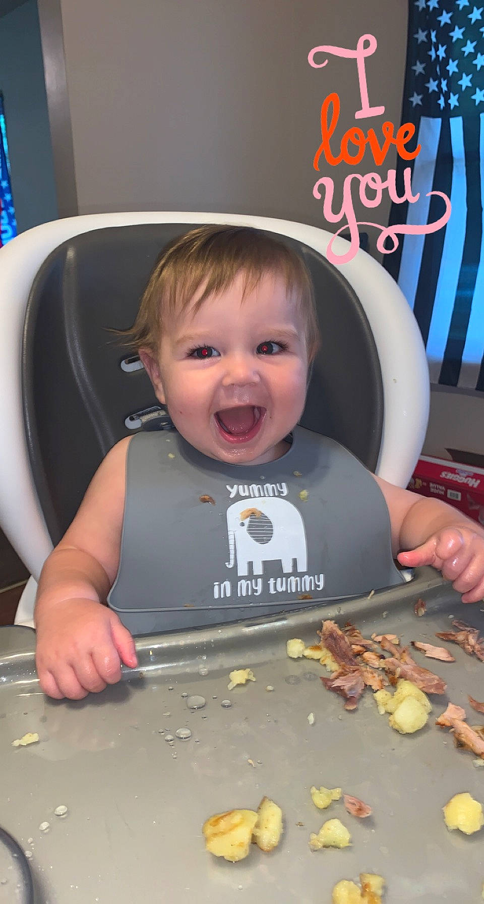 Cameron is registered to the contest to win money with this photo: baby, baby_toddler_clothing, car_seat, chair, child, comfort_food, cuisine, dish, finger, finger_food, fun, happy, junk_food, mouth, organ, person, photo_caption, smile, sweetness, t_shirt
