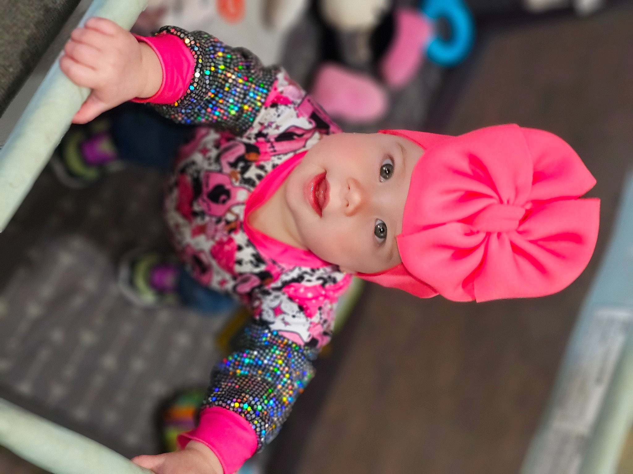 Sofia joined the competition — help win amazing prizes! baby_toys, cheek, child, doll, eyelash, fashion_accessory, fashion_design, fun, headwear, leisure, magenta, pattern, person, pink, plastic, sitting, sleeve, textile, toy
