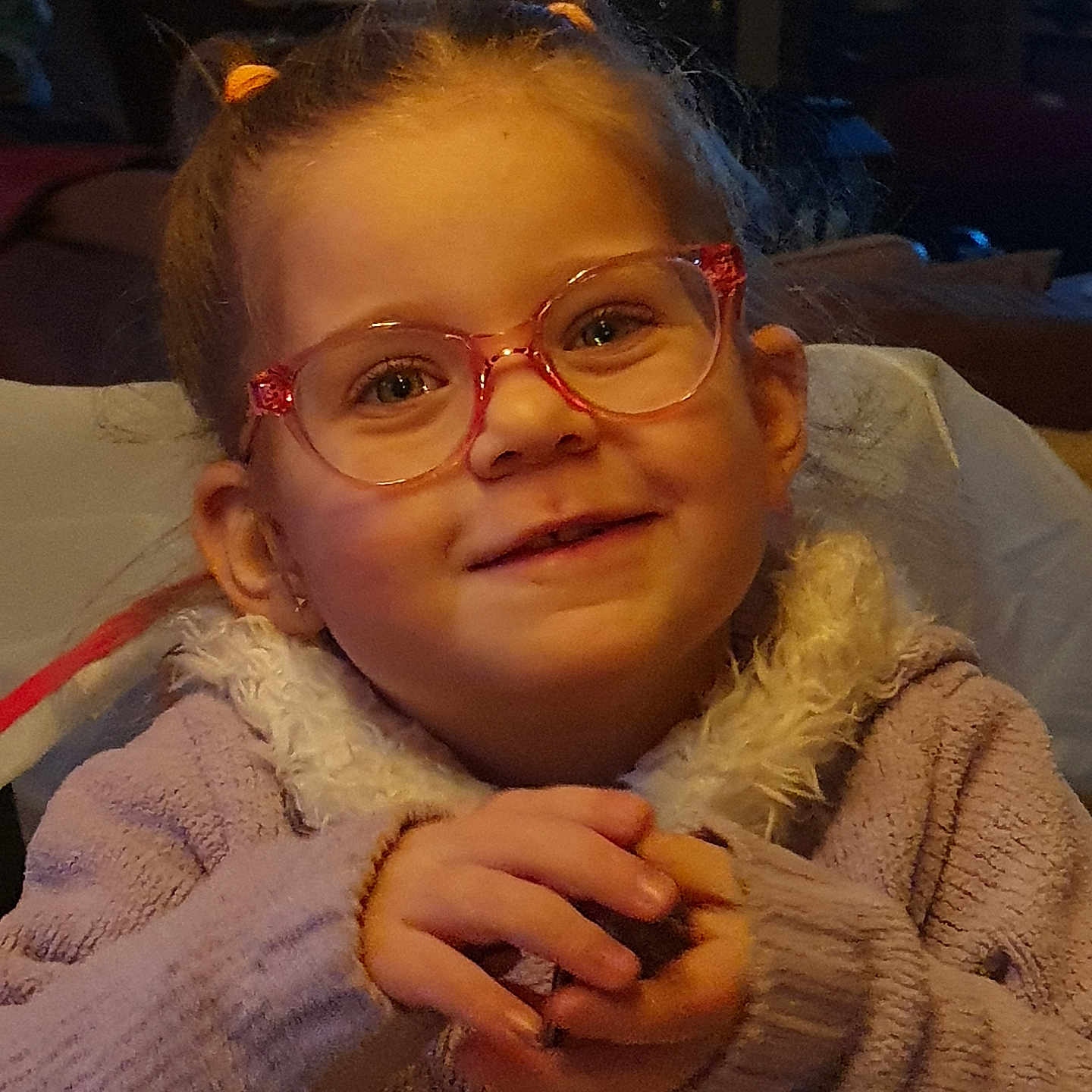 Kenza a rejoint le concours — aidez-le/la à gagner de superbes lots ! accessories, baby, bodypart, clothing, coat, couch, face, finger, furniture, glasses, hand, happy, head, jewelry, knitwear, person, photography, portrait, ring, sweater