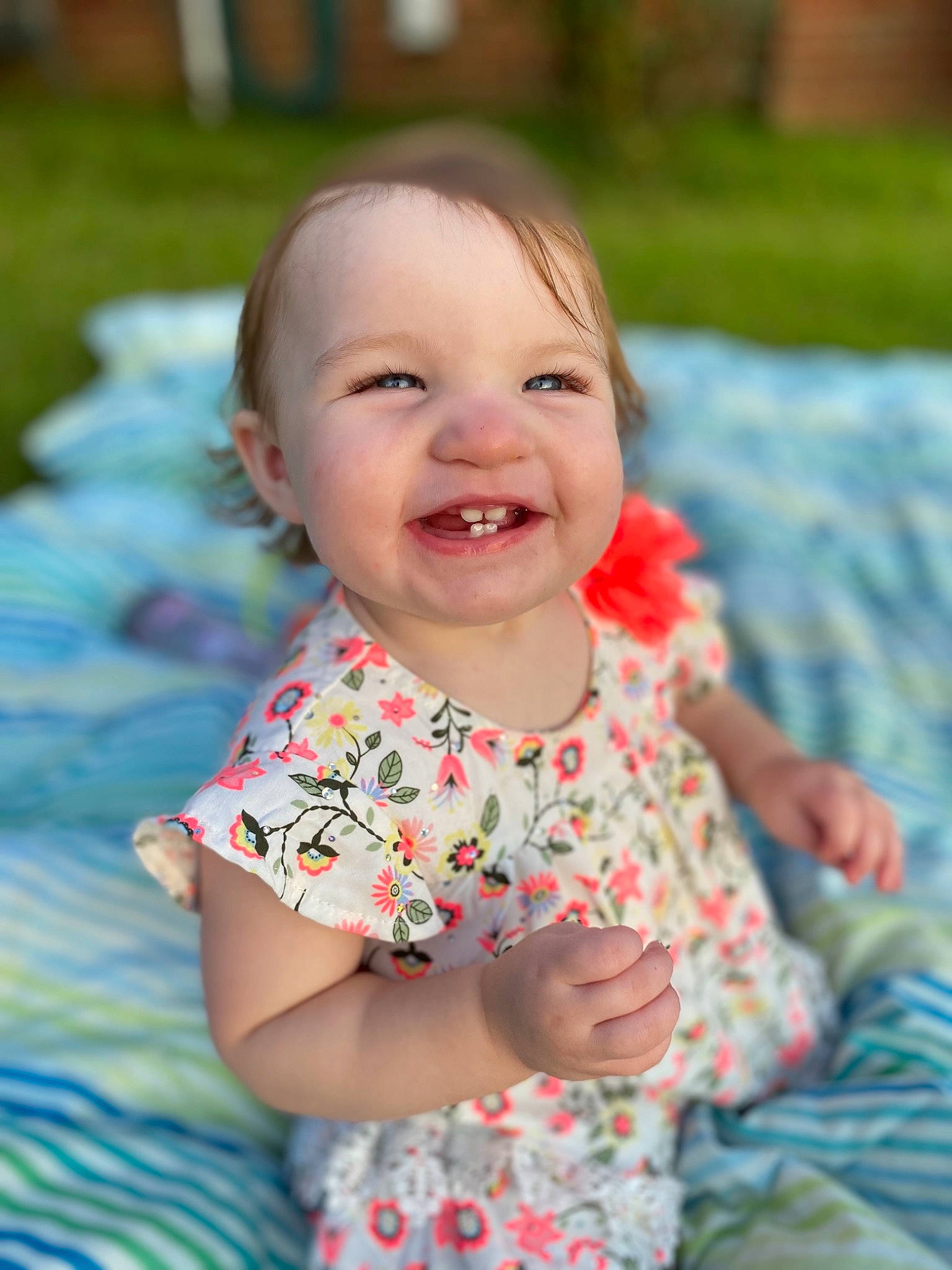 Hadleigh joined the competition — help win amazing prizes! baby, baby_toddler_clothing, cheek, dress, face, facial_expression, grass, happy, iris, joy, leaf, leisure, lip, nose, people_in_nature, person, pink, product, skin, sleeve