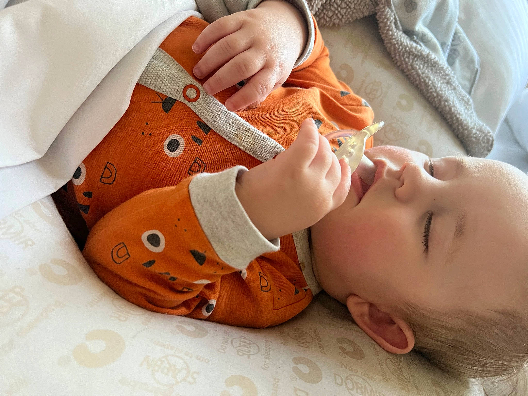 Gavin joined the competition — help win amazing prizes! baby, baby_toddler_clothing, collar, comfort, eye, eyelash, facial_expression, finger, gesture, hand, mouth, nail, neck, nose, orange, pattern, person, skin, sleeve, toddler