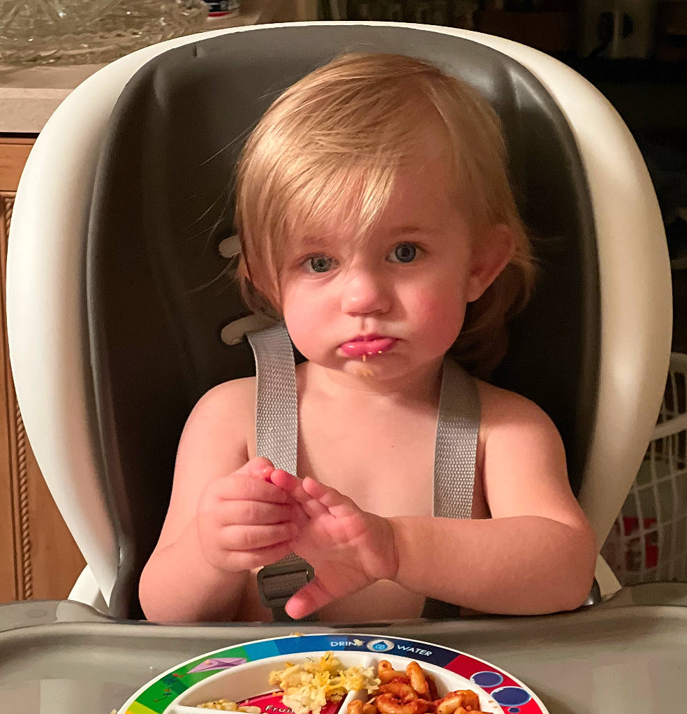Gavin is registered to the contest to win money with this photo: baby, bathing, bowl, chair, child, comfort_food, eyelash, food, food_craving, fork, ingredient, iris, junk_food, person, plate, recipe, spoon, sweetness, table, tableware