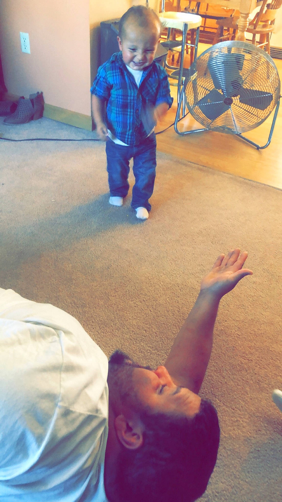 Jakob is registered to the contest to win money with this photo: arm, child, floor, flooring, joint, leg, person, sky