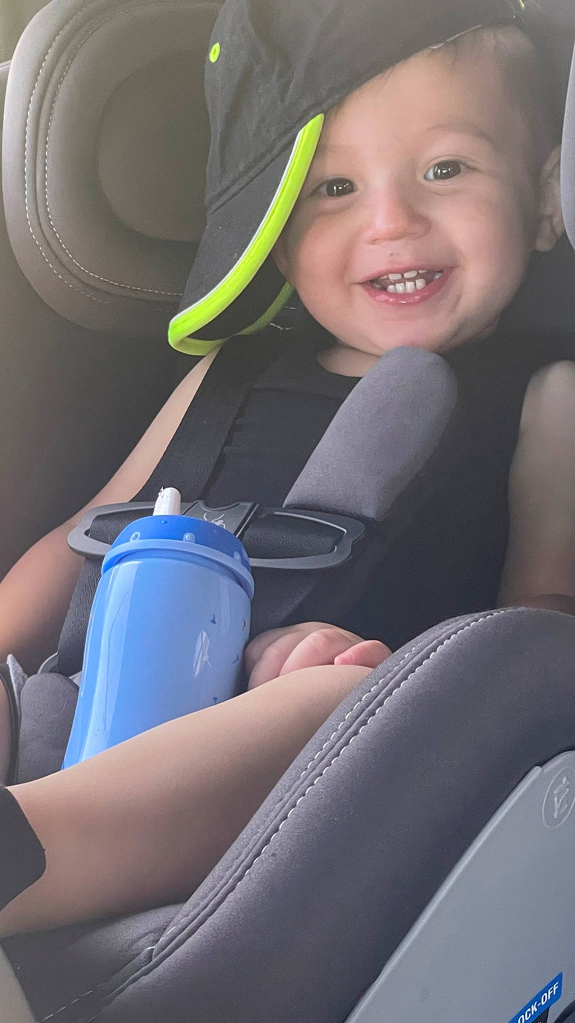Callen is registered to the contest to win money with this photo: auto_part, automotive_design, beauty, car_seat, child, comfort, electric_blue, finger, flash_photography, fun, happy, headwear, human_body, joy, light, mouth, organ, person, photograph, product
