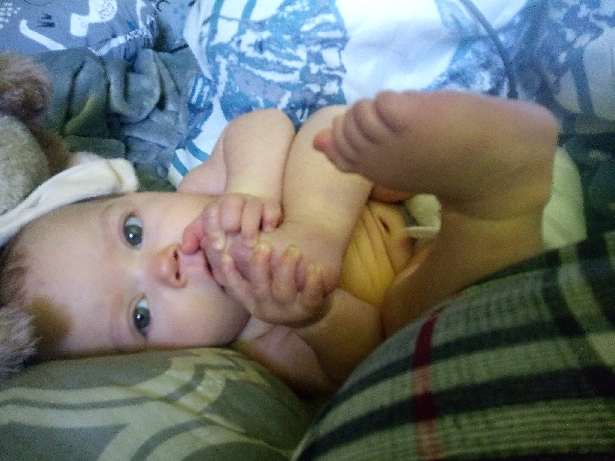 Meadow is registered to the contest to win money with this photo: baby, baby_toddler_clothing, cheek, child, comfort, eye, eyelash, finger, gesture, grass, head, iris, lip, mouth, nail, nose, pattern, person, skin, thumb