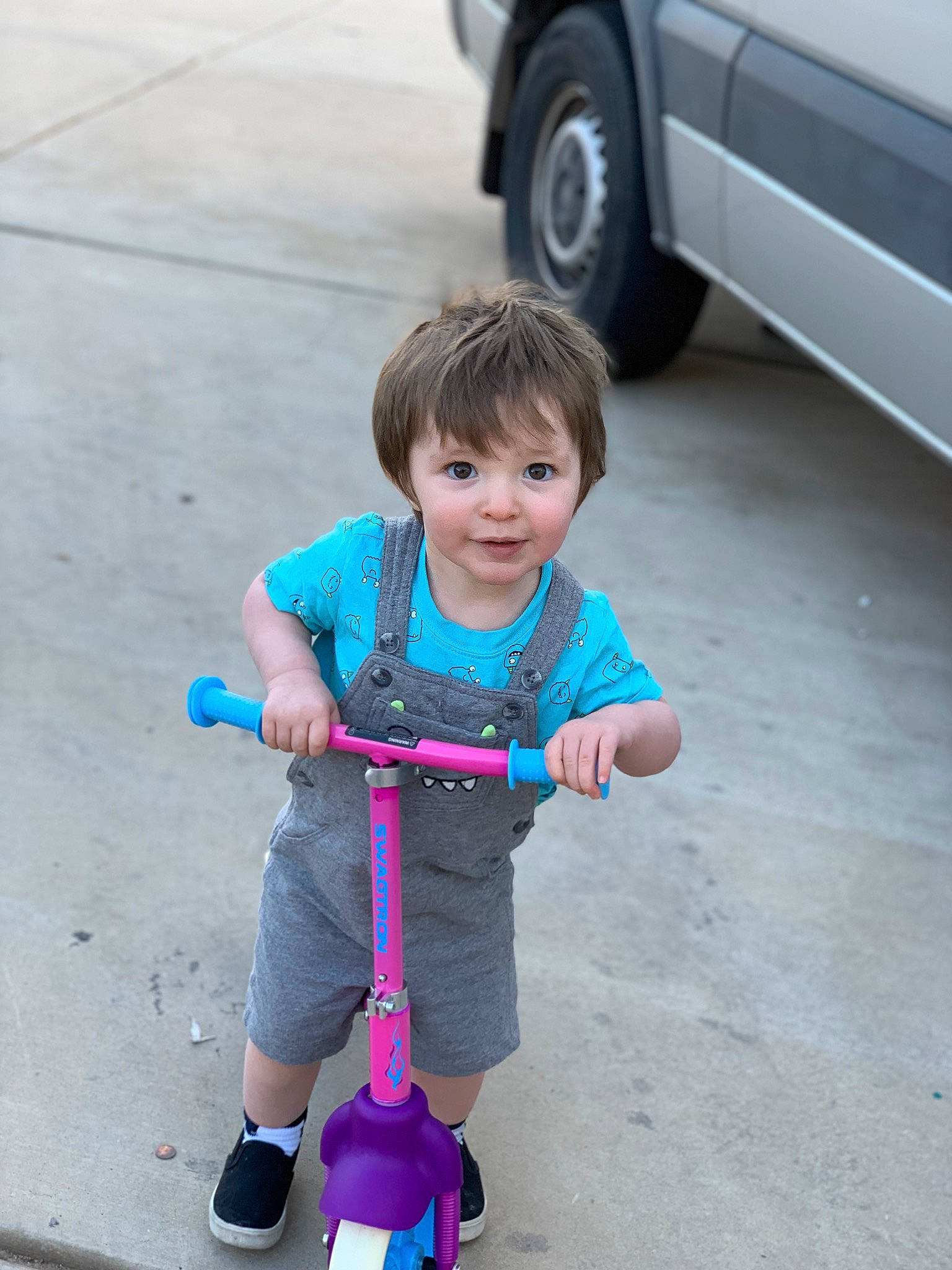 Arden joined the competition — help win amazing prizes! auto_part, automotive_wheel_system, car, child, kick_scooter, land_vehicle, person, play, smile, toddler, tricycle, vehicle, wheel