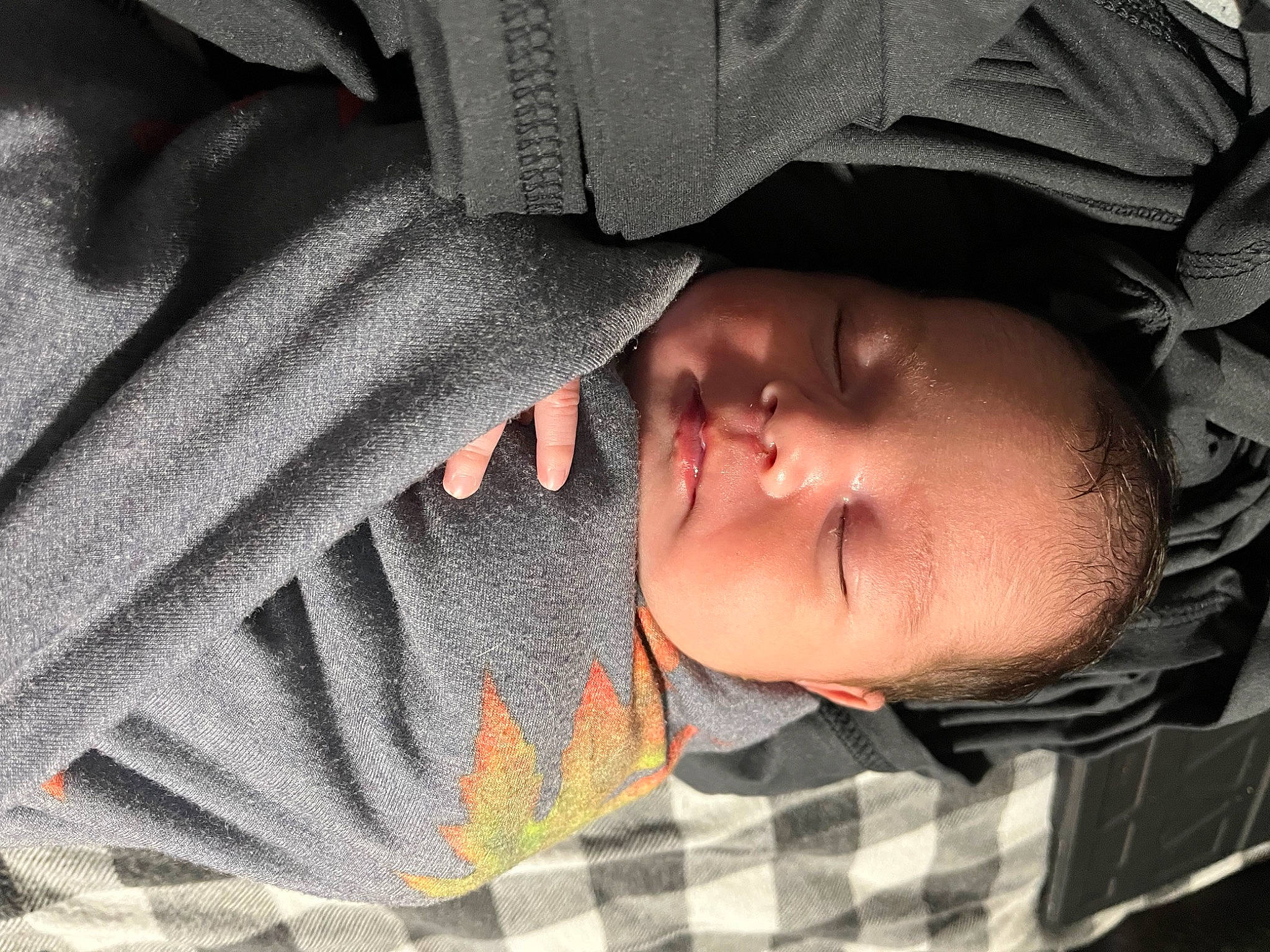 Grey is registered to the contest to win money with this photo: baby, cheek, chin, comfort, eye, eyelash, face, facial_expression, finger, grey, head, headgear, human_body, linens, mouth, nose, person, product, skin, toddler