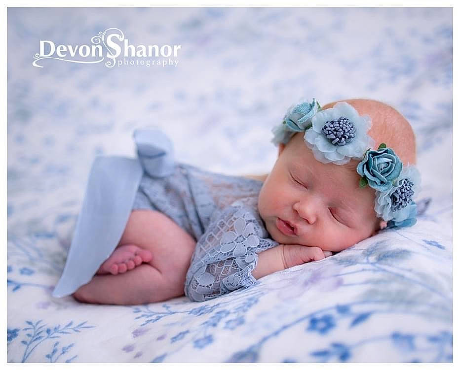 Adalyn is registered to the contest to win money with this photo: baby, baby_sleeping, baby_toddler_clothing, bedtime, child, comfort, dress, fashion_accessory, flash_photography, grass, hair_accessory, happy, hat, headband, headpiece, headwear, linens, pattern, people_in_nature, person