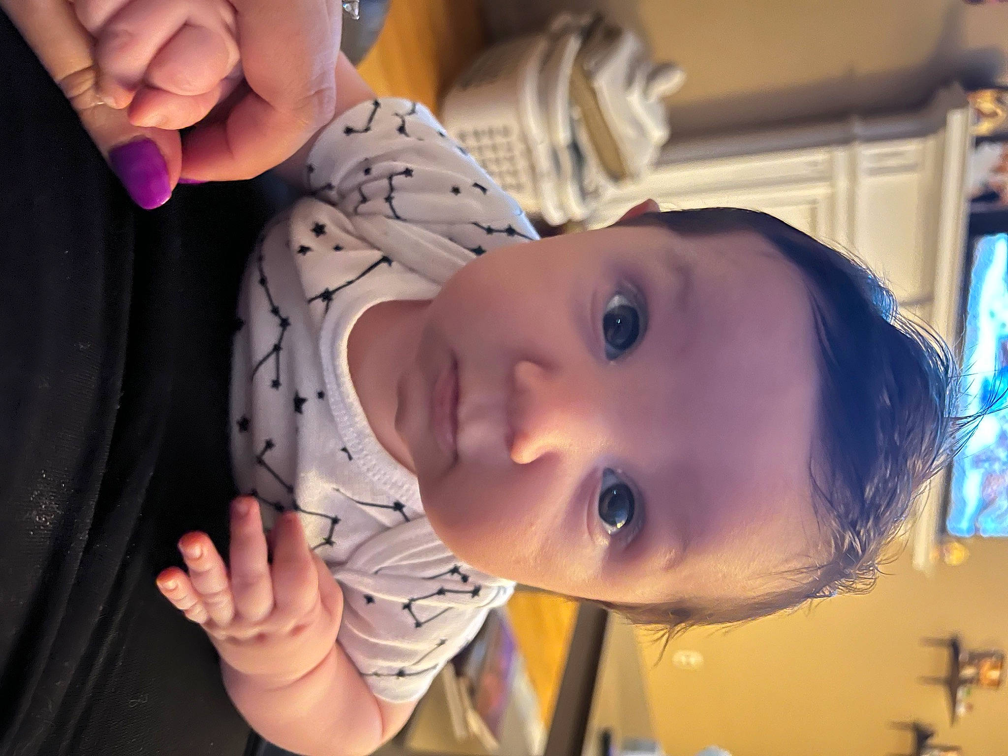 Georgie is registered to the contest to win money with this photo: baby, baby_toddler_clothing, cheek, ear, eyebrow, eyelash, finger, gesture, hand, happy, human_body, iris, lip, mouth, neck, nose, organ, person, skin, smile