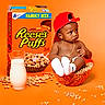 Roman is registered to the contest to win money with this photo: baby, infant, child, portrait, cereal, breakfast, milk, cereal_box, reeses_puffs, bowl, red_cap, gold_chain, diaper, socks, sitting, indoor, studio, orange_background, food, advertisement
