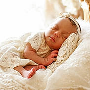 Nëlya participe au concours pour gagner de l'argent avec cette photo : baby, sleeping, infant, lace, pillow, blanket, headband, soft, cozy, peaceful, newborn, face, hand, foot, bed, fabric, portrait, closeup, cute, rest