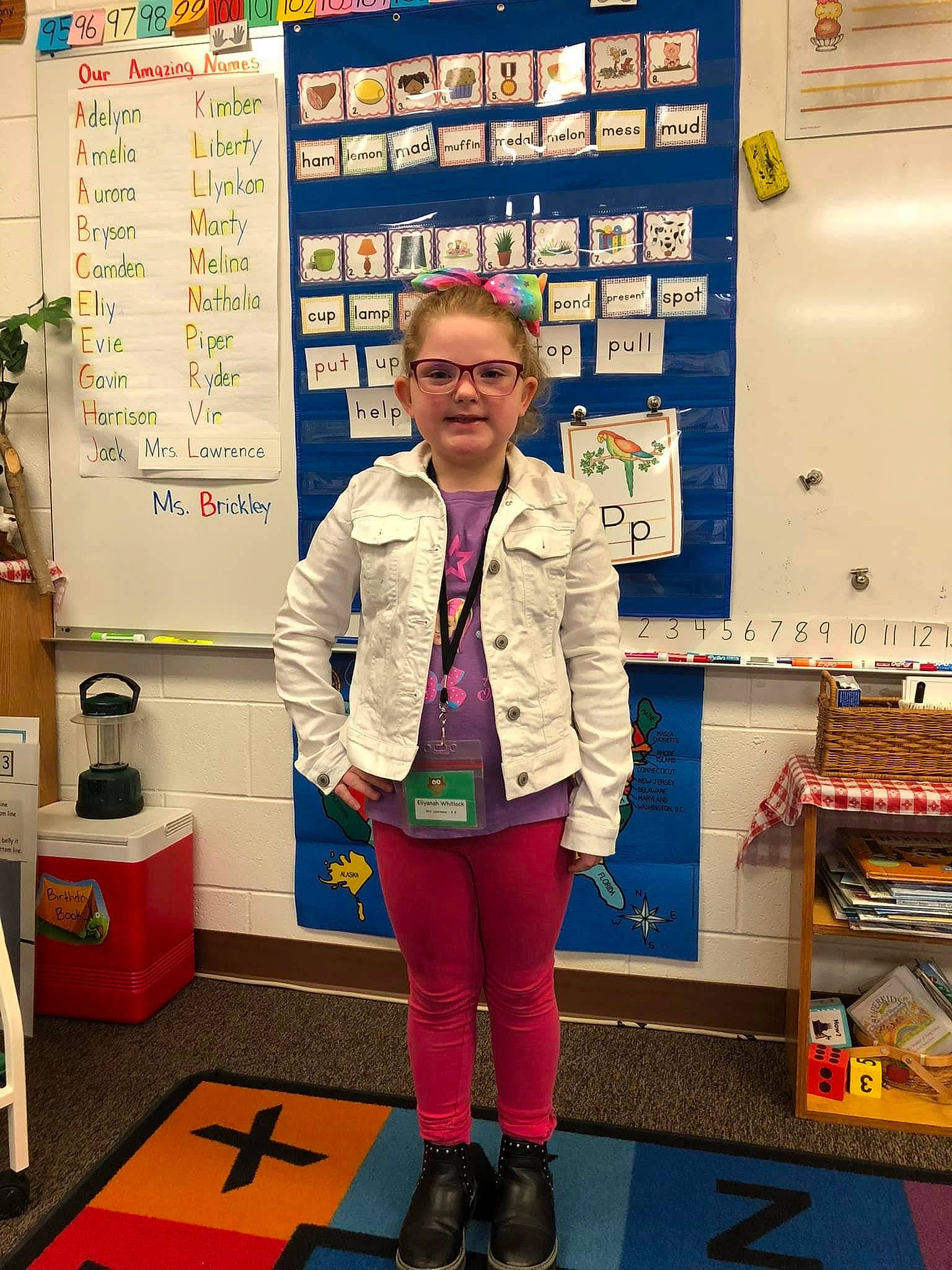 Eliyanah is registered to the contest to win money with this photo: boot, carpet, display_board, electric_blue, event, eyewear, fashion_design, flooring, job, machine, person, photograph, retail, room, scarf, shelf, visual_arts