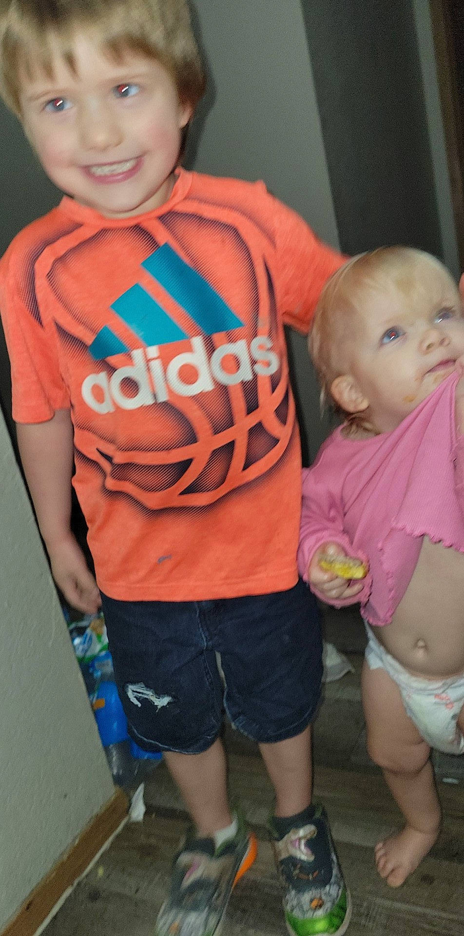 Braxton is registered to the contest to win money with this photo: baby_toddler_clothing, cheek, clothing, eye, face, finger, joint, joy, leg, mammal, mouth, muscle, orange, organ, person, pink, shorts, shoulder, skin, sleeve