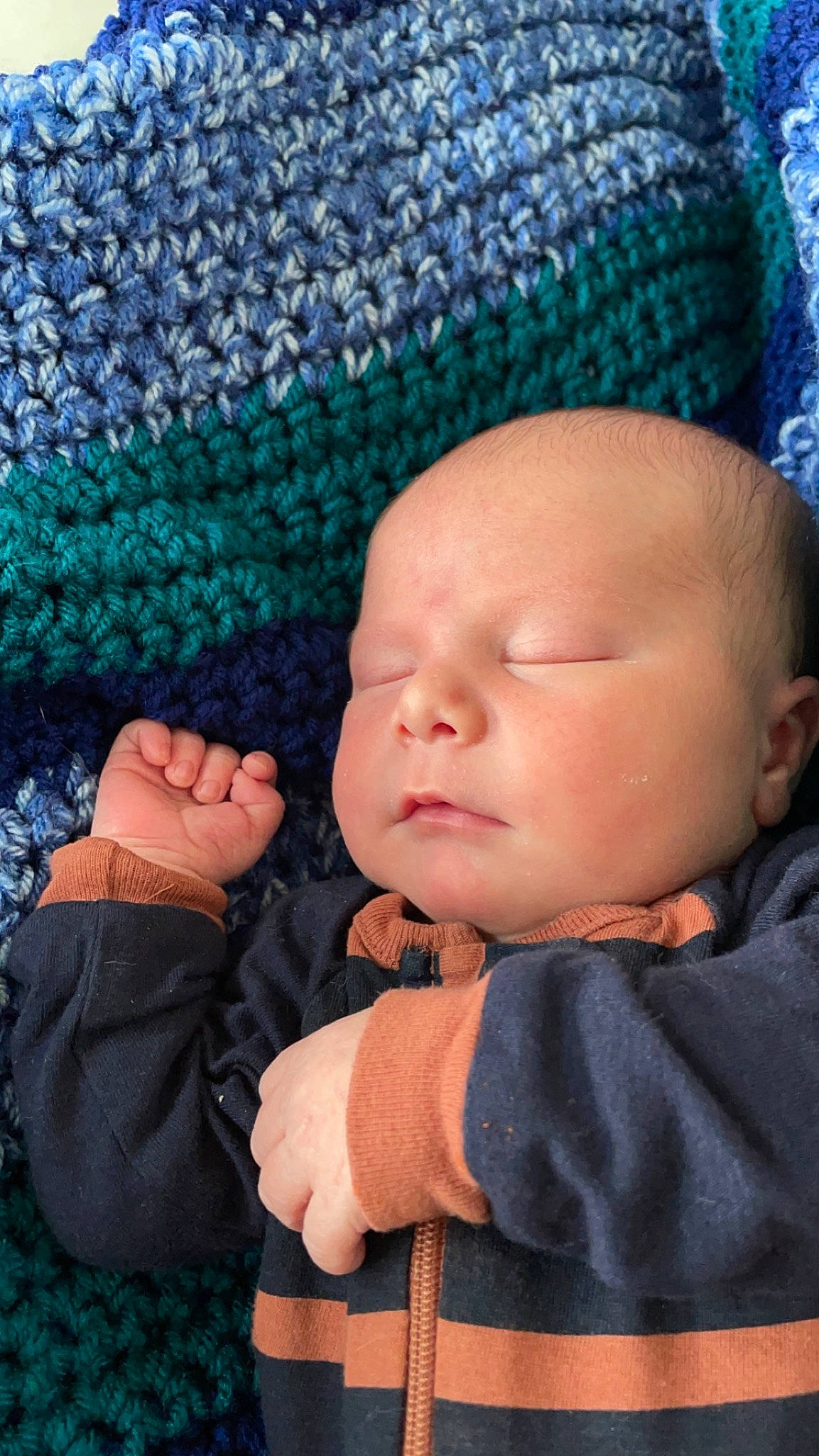 Benny joined the competition — help win amazing prizes! baby, baby_toddler_clothing, blue, cap, cheek, comfort, cool, eye, finger, gesture, green, hand, headgear, nose, outerwear, person, pink, skin, sleeve, textile