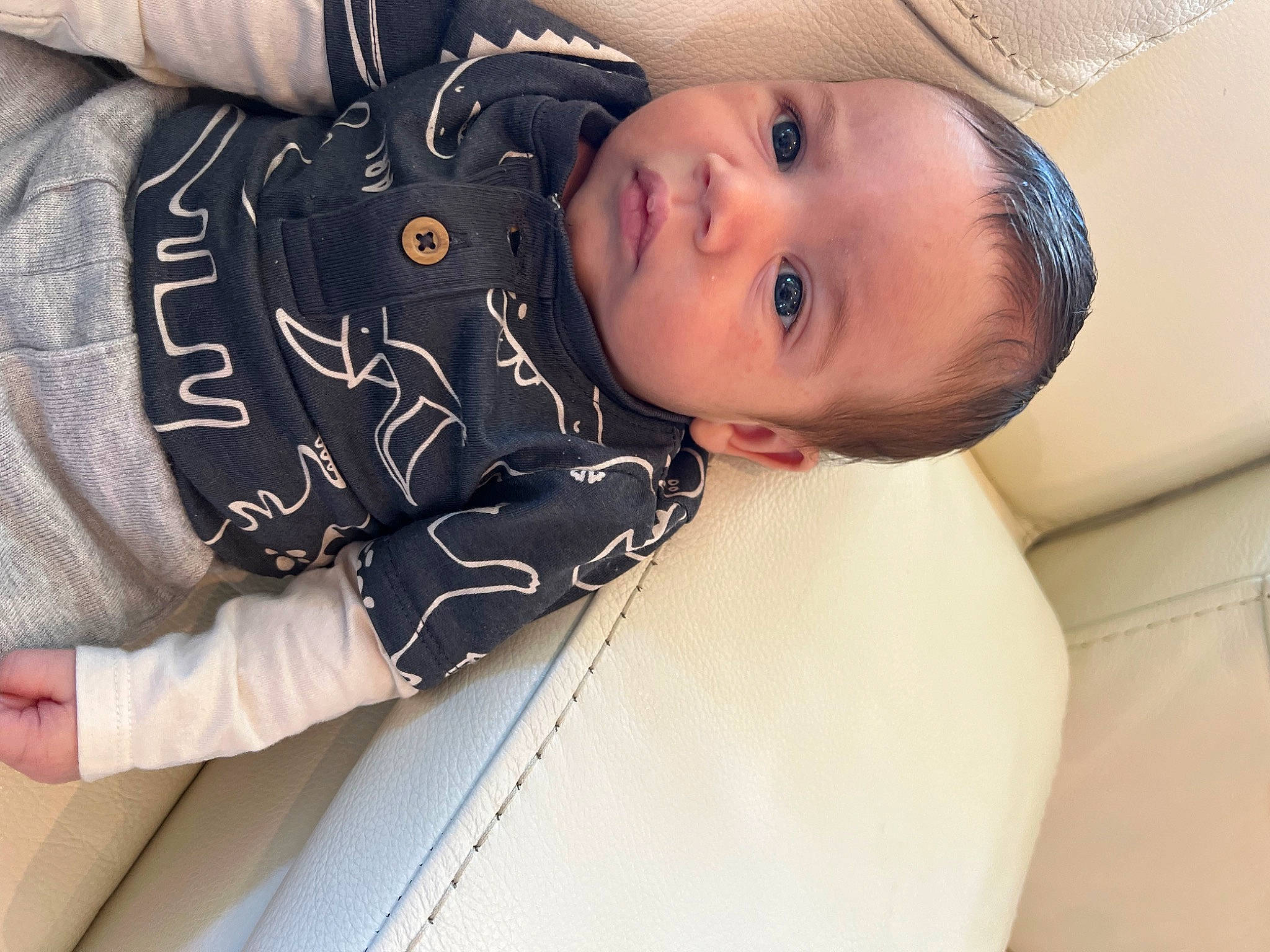 Mikael joined the competition — help win amazing prizes! baby, baby_toddler_clothing, cheek, child, collar, comfort, eye, eyelash, face, fashion_accessory, flash_photography, gesture, happy, iris, pattern, person, sitting, skin, sleeve, smile
