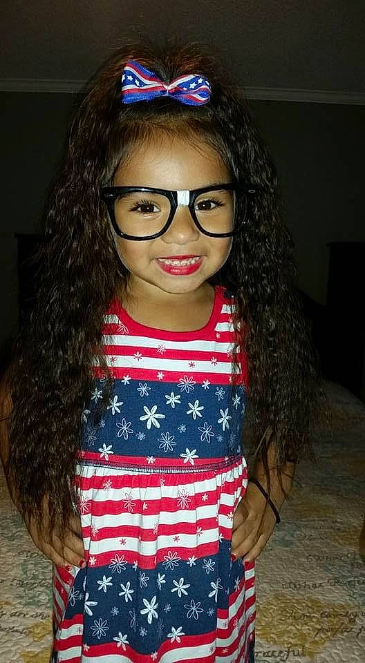 Miracle is registered to the contest to win money with this photo: black, black_hair, chin, cool, eye, eyelash, face, facial_expression, fashion_design, hair, happy, head, headgear, iris, joy, lip, lipstick, person, red, skin