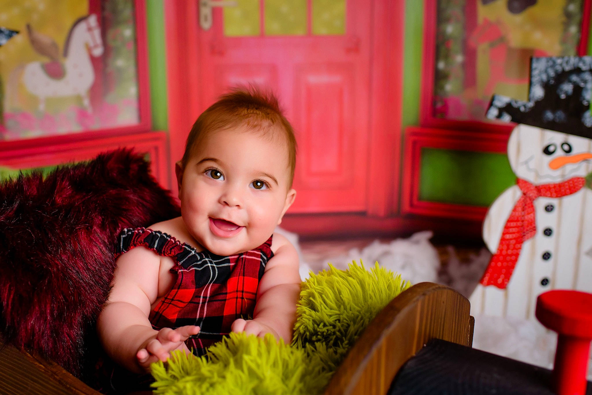 Marco is registered to the contest to win money with this photo: baby, child, christmas, christmas_eve, event, happy, holiday, joy, person, photography, plaid, room, smile, stuffed_toy, toddler, toy, tree, yellow
