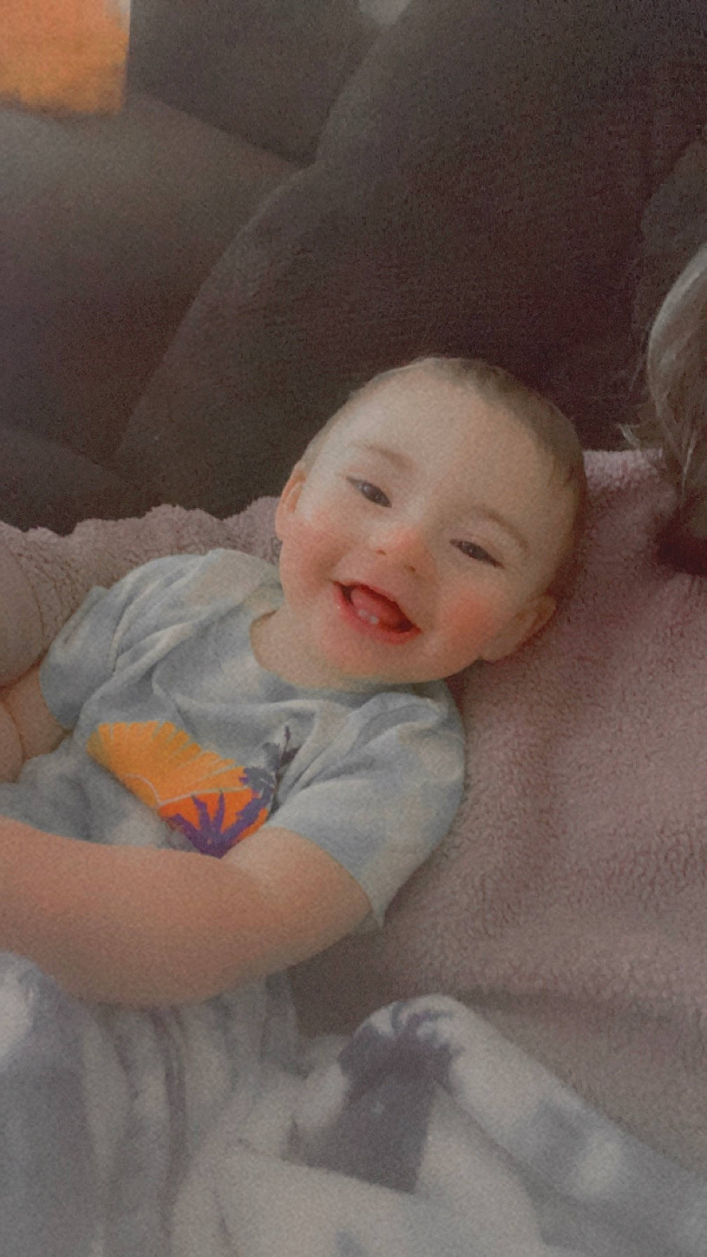 Brantley is registered to the contest to win money with this photo: baby, baby_toddler_clothing, beauty, cheek, comfort, eye, face, flash_photography, fun, happy, head, iris, joy, linens, nose, person, sitting, skin, sleeve, smile