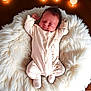 baby, child, comfort, cozy, cushion, cute, fluffy, giraffe, indoors, infant, newborn, onesie, peaceful, plush, portrait, relaxing, sleep, sleeping, soft, warm_lighting
