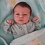 baby, infant, blanket, blue_blanket, flower_pattern, cozy, cute, fist, sleepwear, young_child, portrait, face, head, indoors, soft_texture, newborn, person, resting, wrapped, sleeping_area