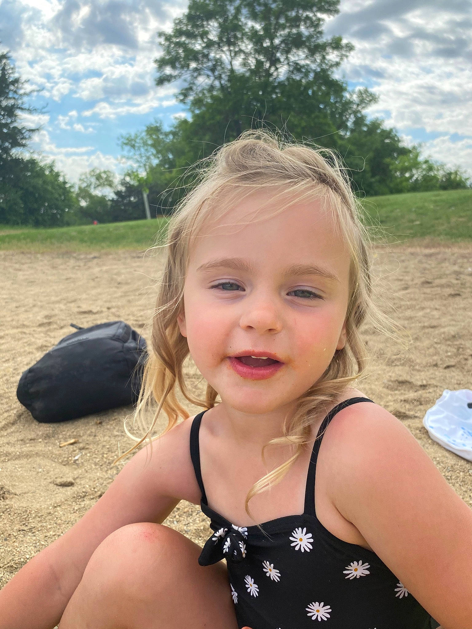 Kadence joined the competition — help win amazing prizes! blond, child, face, fawn, fun, grass, hair, happy, leisure, neck, person, sitting, skin, smile, summer, sun_tanning, toddler, vacation