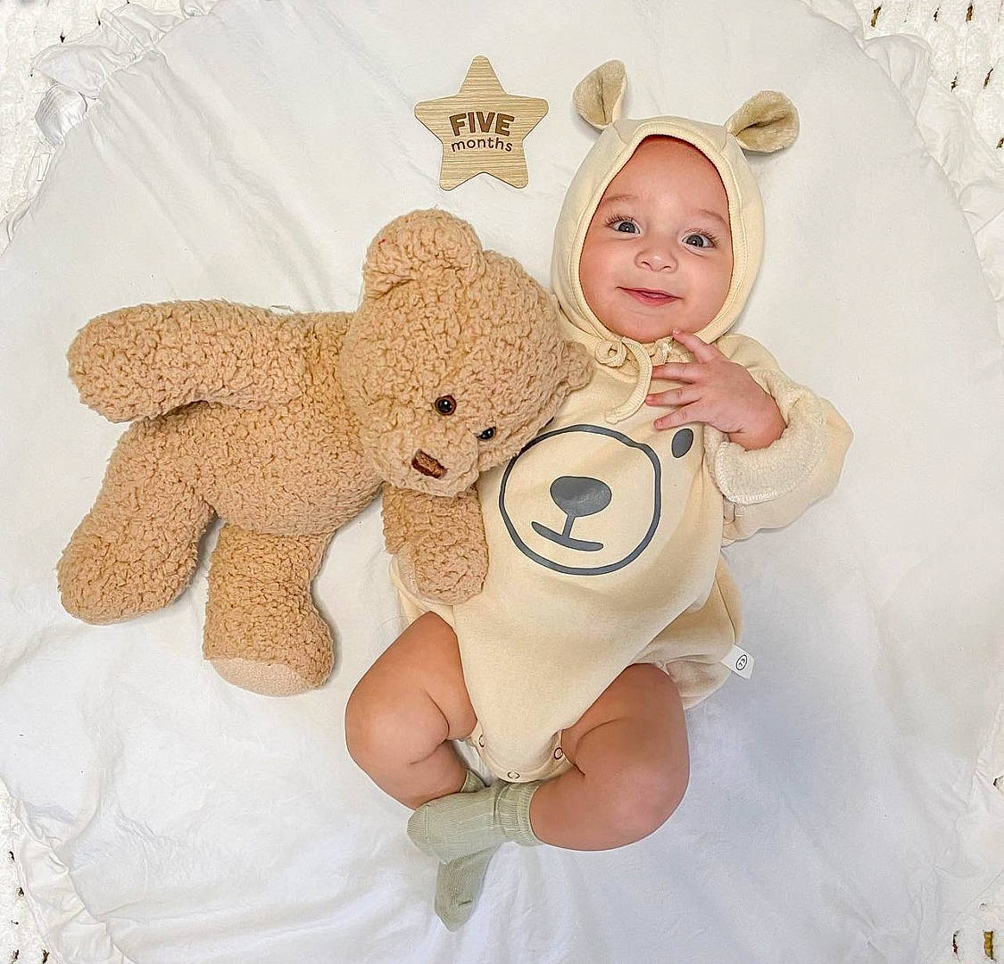 Brooks is registered to the contest to win money with this photo: baby, baby_products, baby_sleeping, baby_toddler_clothing, baby_toys, child, comfort, eyelash, fawn, happy, head, headwear, joy, linens, pattern, person, skin, sleeve, stuffed_toy, thumb