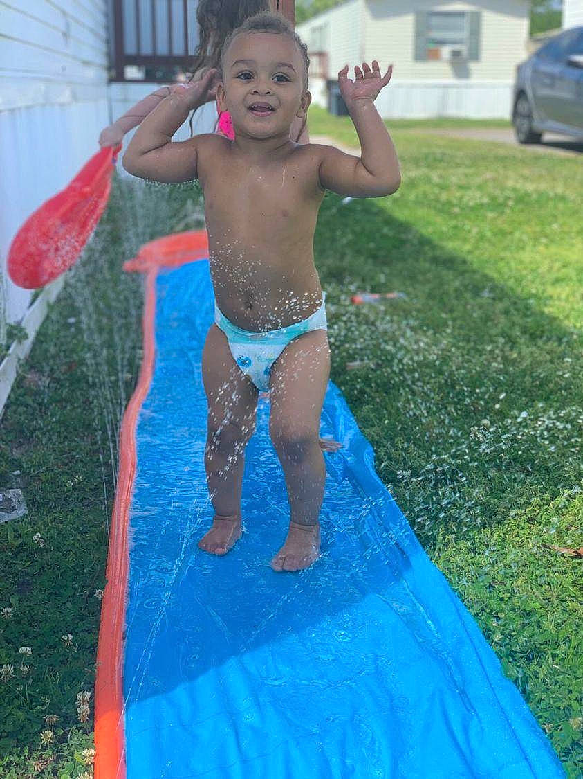Niko joined the competition — help win amazing prizes! barechested, barefoot, bathing, blue, chest, fun, grass, happy, lawn, leg, leisure, person, recreation, summer, swimming_pool, swimwear, thigh, toddler, underpants, water
