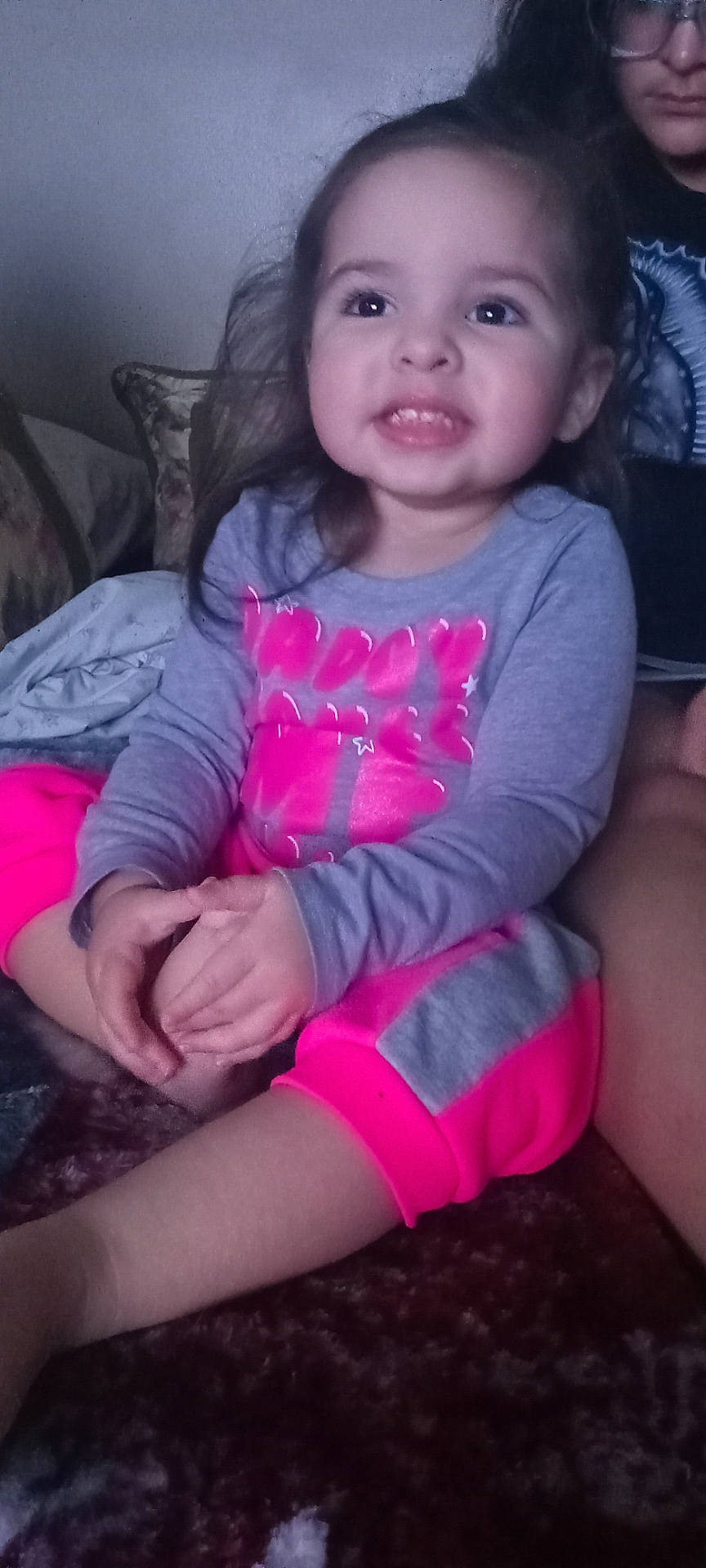 Jenifer joined the competition — help win amazing prizes! accessories, baby, bodypart, clothing, couch, cushion, face, finger, furniture, glasses, hand, happy, head, homedecor, person, photography, portrait, shorts, smile, t_shirt