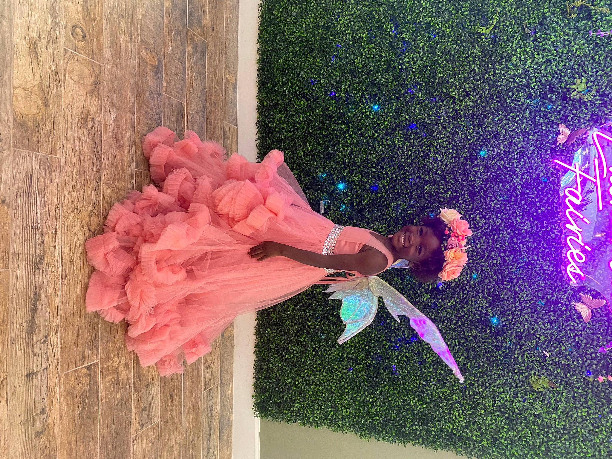 Shay is registered to the contest to win money with this photo: art, dress, event, fashion_accessory, fun, grass, happy, headpiece, illustration, joy, magenta, peach, people_in_nature, person, petal, pink, plant, purple, visual_arts, wood