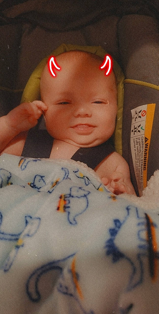 Jeremy is registered to the contest to win money with this photo: baby, baby_sleeping, cap, cheek, comfort, eye, eyebrow, finger, happy, head, human, lip, mammal, mouth, nose, person, skin, smile, textile, thumb