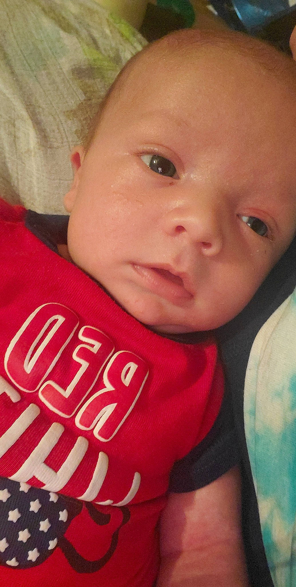 Jeremy is registered to the contest to win money with this photo: baby, baby_toddler_clothing, cheek, chin, ear, eyebrow, eyelash, forehead, human_body, iris, lip, mammal, mouth, neck, nose, organ, person, pink, skin, sleeve