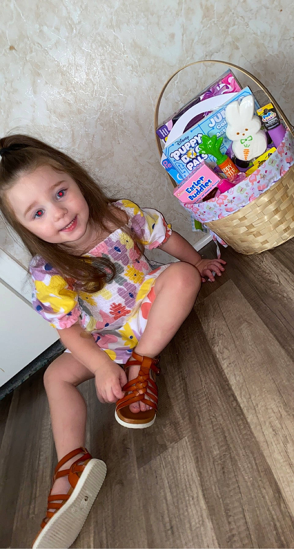 Adeline joined the competition — help win amazing prizes! baby_toddler_clothing, child, flooring, fun, happy, hardwood, human_leg, joy, leisure, person, play, sandal, shoe, sitting, smile, sock, thigh, toddler, varnish, wood