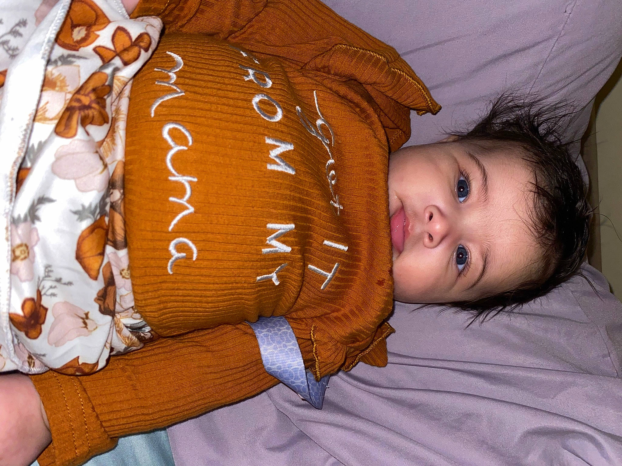 Kaycee joined the competition — help win amazing prizes! abdomen, child, comfort, elbow, fur, happy, human_leg, linens, mammal, pattern, peach, person, room, sitting, smile, textile, toddler, trunk