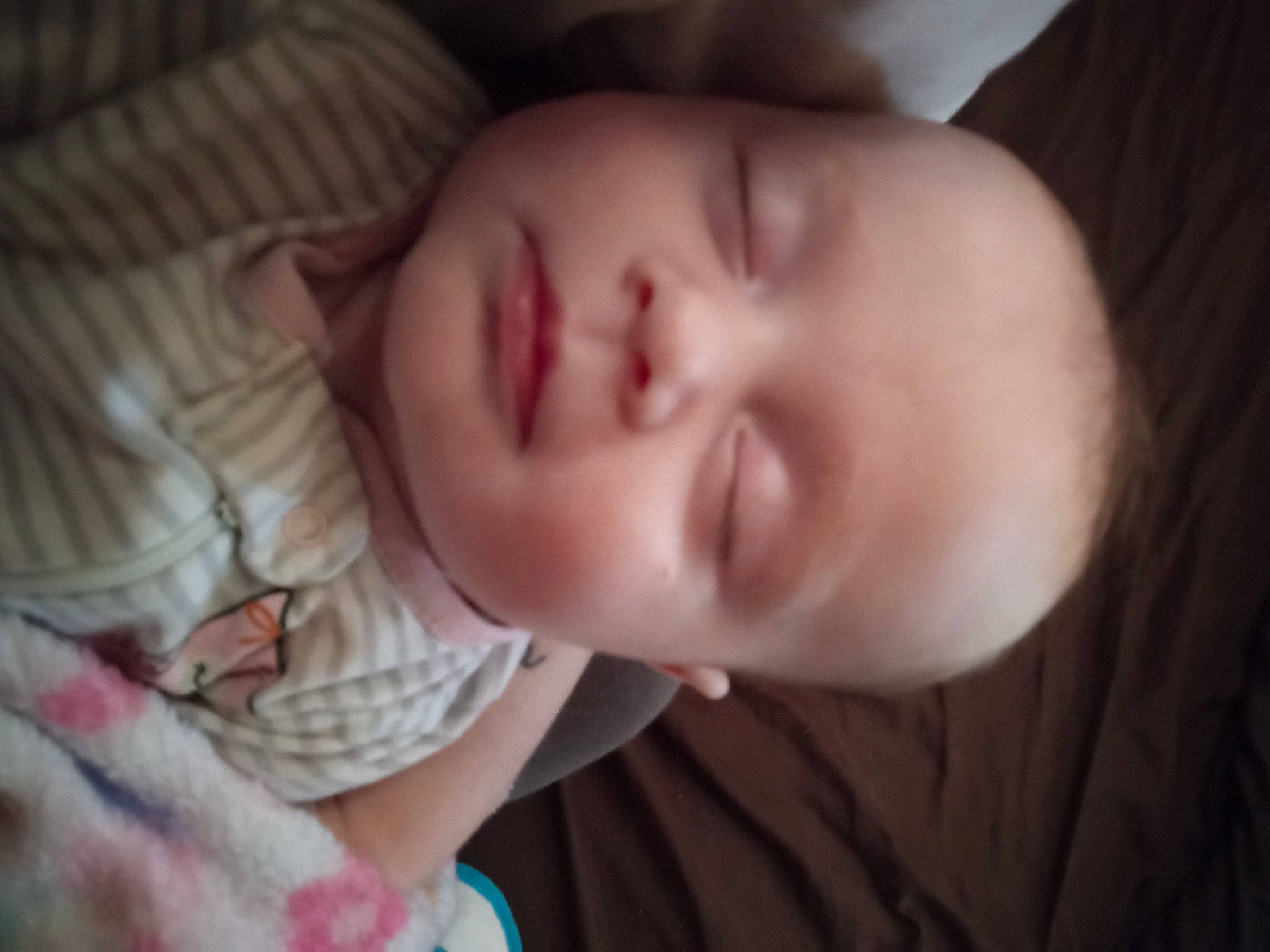 Isabella is registered to the contest to win money with this photo: baby, baby_toddler_clothing, cheek, comfort, ear, eye, eyebrow, eyelash, hair, happy, human_body, iris, lip, mouth, neck, nose, person, skin, sleeve, smile