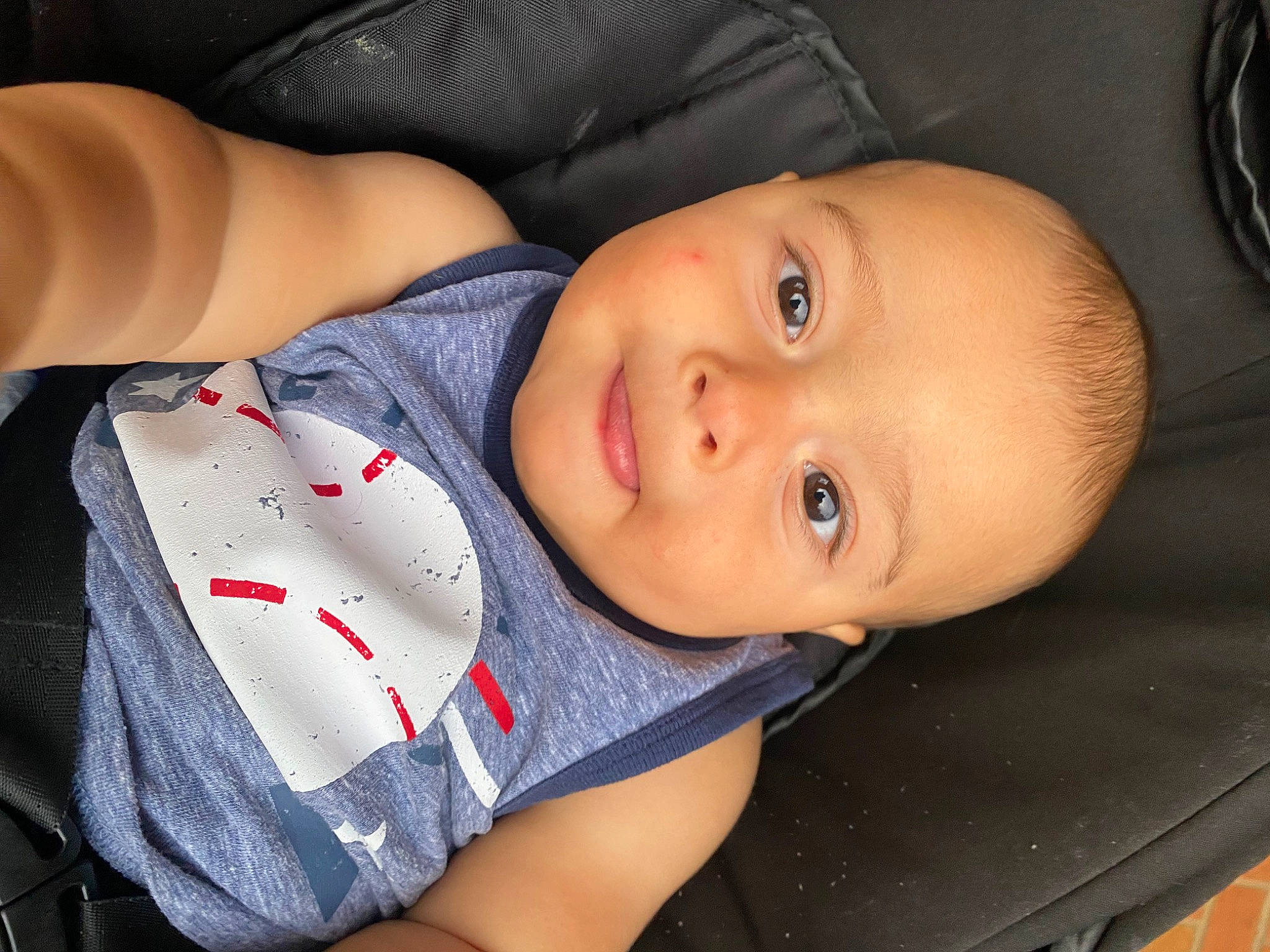 Logan joined the competition — help win amazing prizes! arm, baby, baby_toddler_clothing, cheek, chin, comfort, elbow, eyelash, finger, flash_photography, happy, iris, lip, mouth, neck, nose, person, skin, sleeve, smile