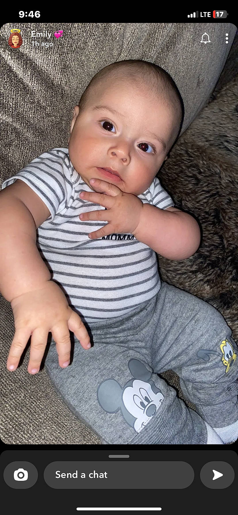 Logan is registered to the contest to win money with this photo: baby, baby_toddler_clothing, cheek, child, comfort, finger, flash_photography, hand, happy, head, iris, lip, nose, person, sitting, skin, sleeve, standing, t_shirt, toddler