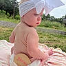 Wrenlee is registered to the contest to win money with this photo: baby, back, blanket, bow, child, cute, diaper, grass, headband, infant, nature, outdoor, pink, portrait, seven_months, sign, sitting, skin, soft, young_child