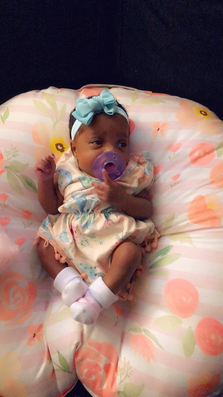 Chanel is registered to the contest to win money with this photo: baby, baby_products, baby_safety, baby_sleeping, baby_toddler_clothing, bedtime, cheek, child, comfort, event, hand, hat, linens, pattern, peach, person, petal, pink, room, skin