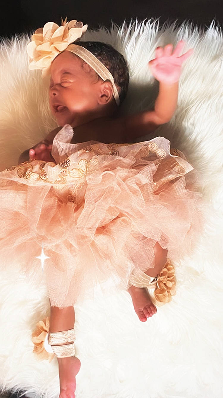 Chanel joined the competition — help win amazing prizes! ballet_tutu, cap, child, dance, entertainment, event, fashion_design, feather, fun, fur, fur_clothing, glove, happy, headgear, headpiece, peach, performing_arts, person, pink, ruffle