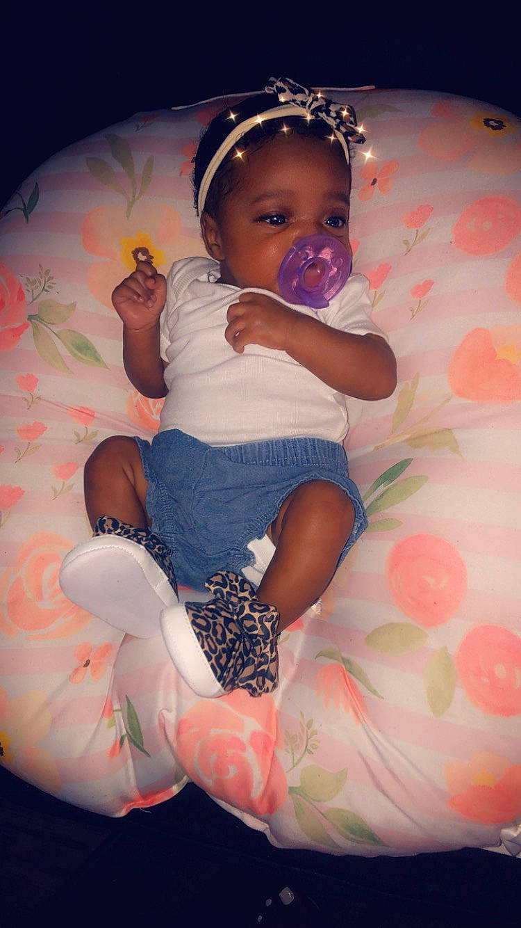 Chanel joined the competition — help win amazing prizes! baby, baby_toddler_clothing, child, comfort, event, facial_expression, flash_photography, fun, happy, hat, human_leg, magenta, pattern, person, pink, purple, sitting, skin, t_shirt, thigh